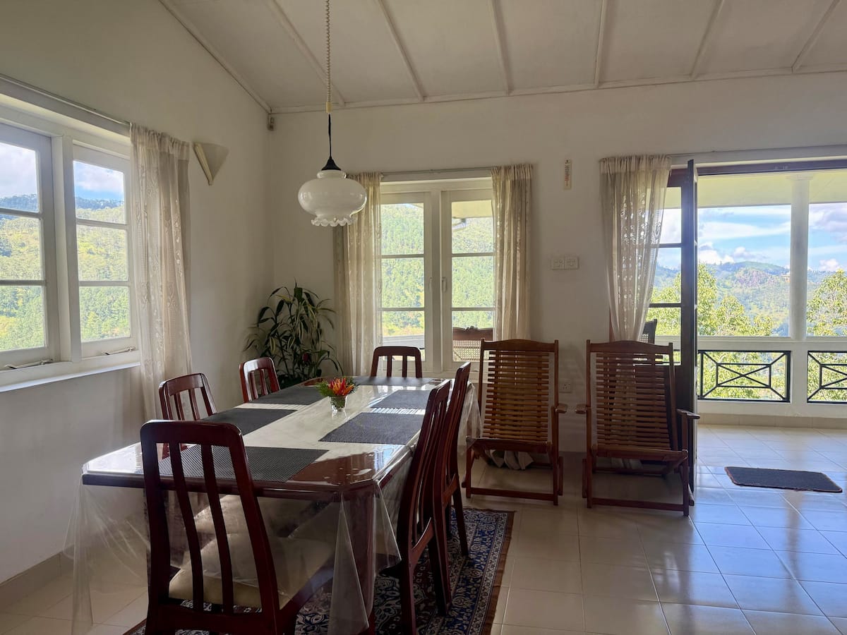 Dining room and balcony doors at Villa Krista, Ella