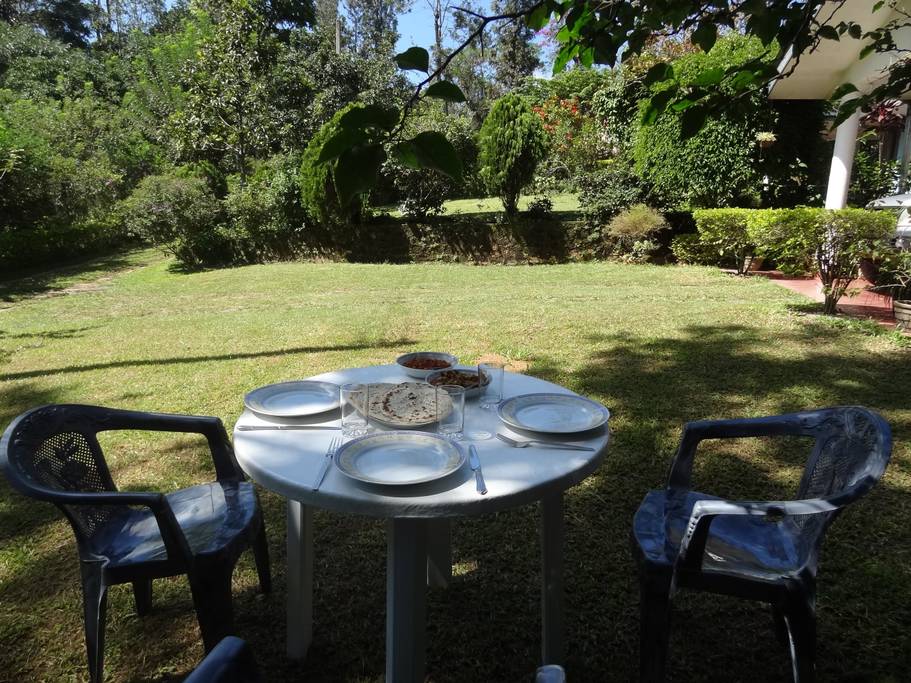 A meal outdoors in the garden at Villa Krista, Ella